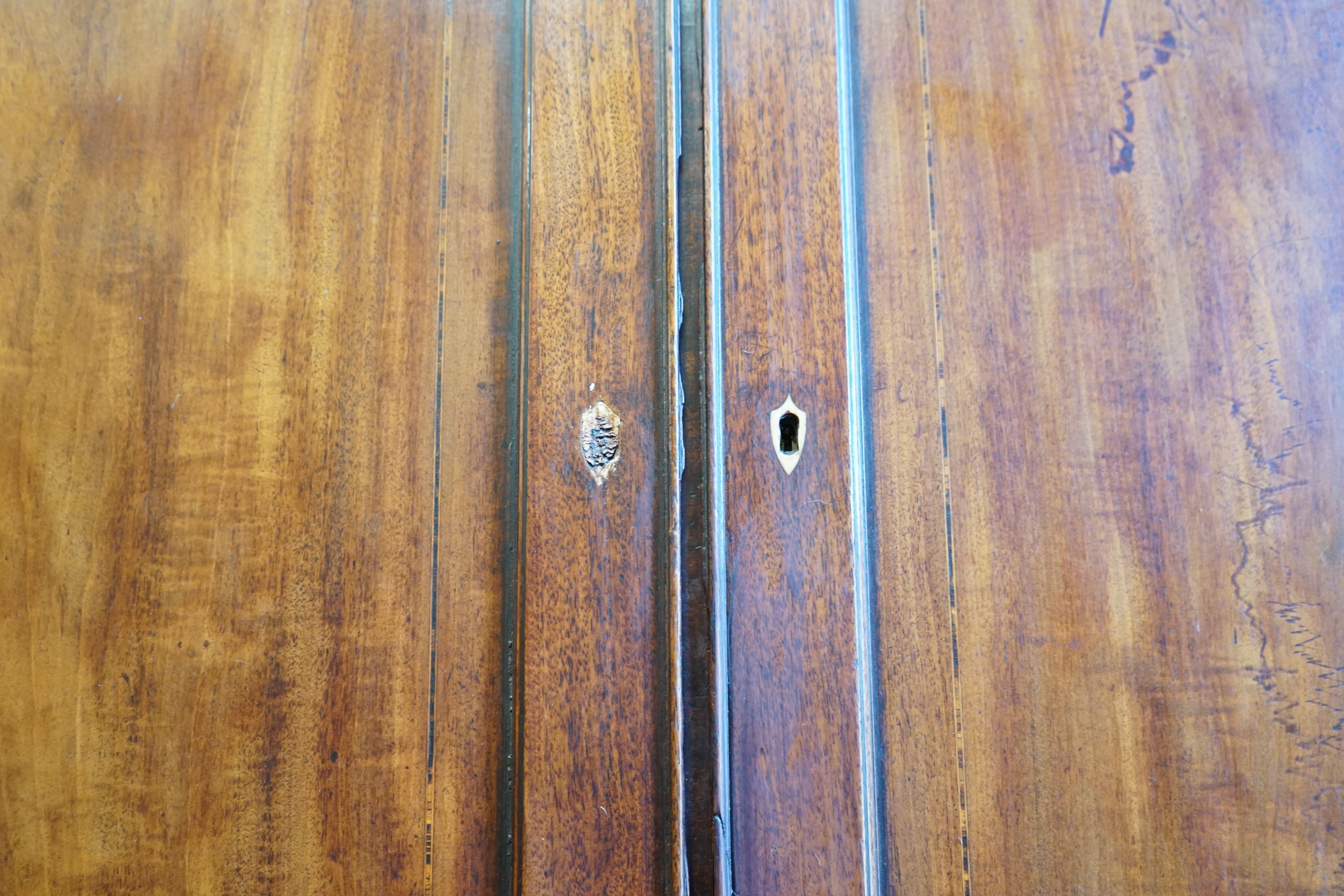 A George III inlaid mahogany bureau bookcase, width 120cm, depth 56cm, height 224cm